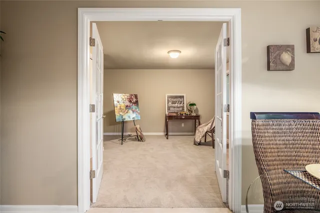 a view of livingroom with furniture and closet