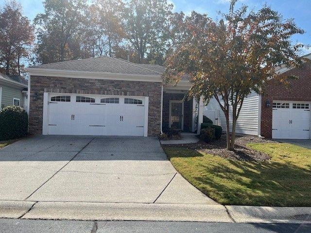 238 Abercorn Way Woodstock, GA 30188 - Photo 2 of 27 a view of a entrance gate of the house