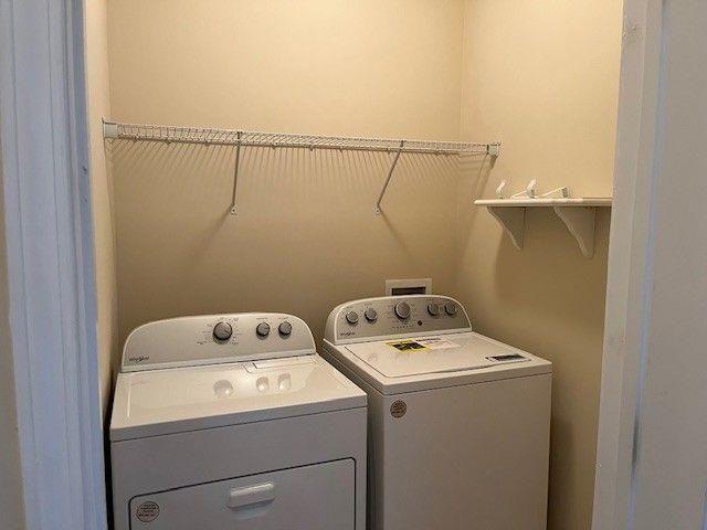 238 Abercorn Way Woodstock, GA 30188 - Photo 21 of 27 a utility room with dryer and washer