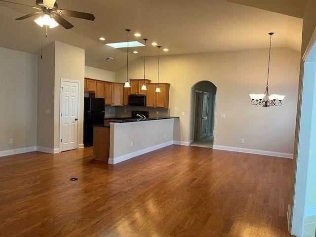 238 Abercorn Way Woodstock, GA 30188 - Photo 5 of 27 a view of a kitchen with a sink and a refrigerator