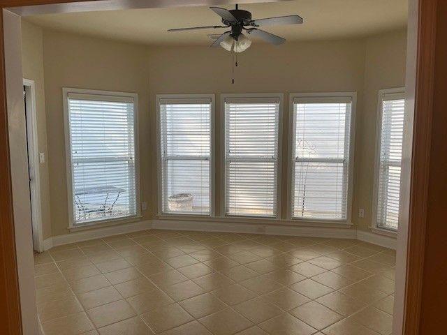 238 Abercorn Way Woodstock, GA 30188 - Photo 10 of 27 a view of an empty room with a window