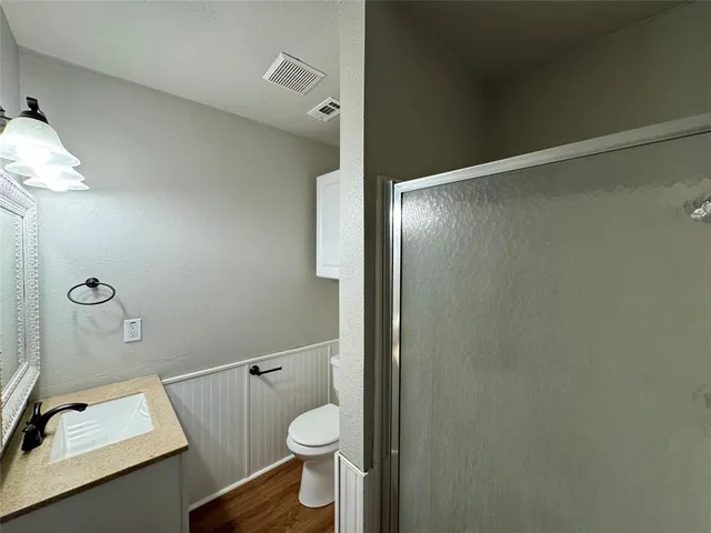 a bathroom with a sink and a toilet