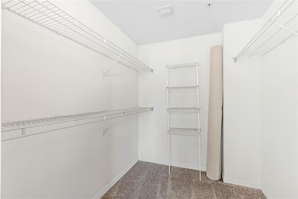 2421 Northeast 65th Street, Unit 318 Fort Lauderdale, FL 33308 - Photo 18 of 31 a view of an empty walk in closet