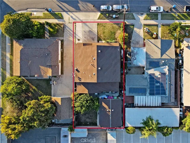 an aerial view of a houses on street