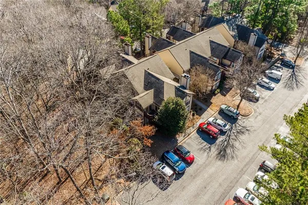 an aerial view of a house with outdoor space