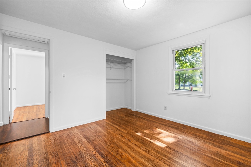 18 Pullard Road Grafton, MA 01519 - Photo 17 of 28 a view of empty room with wooden floor and fan