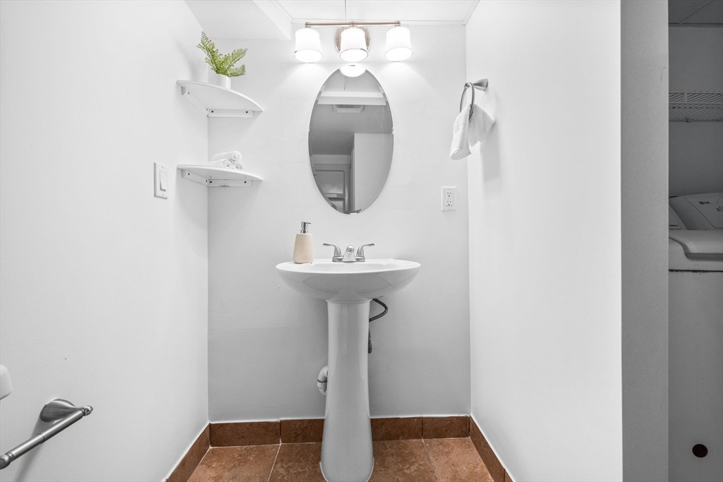 18 Pullard Road Grafton, MA 01519 - Photo 22 of 28 a bathroom with a sink and a mirror