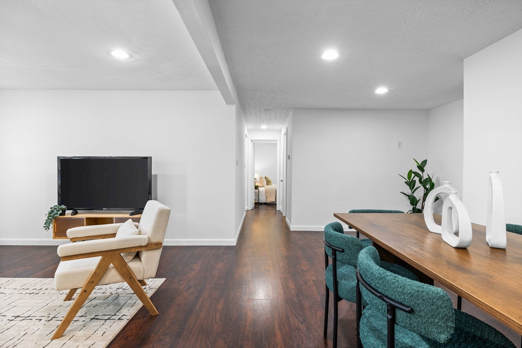18 Pullard Road Grafton, MA 01519 - Photo 4 of 28 a view of a workspace with furniture and wooden floor