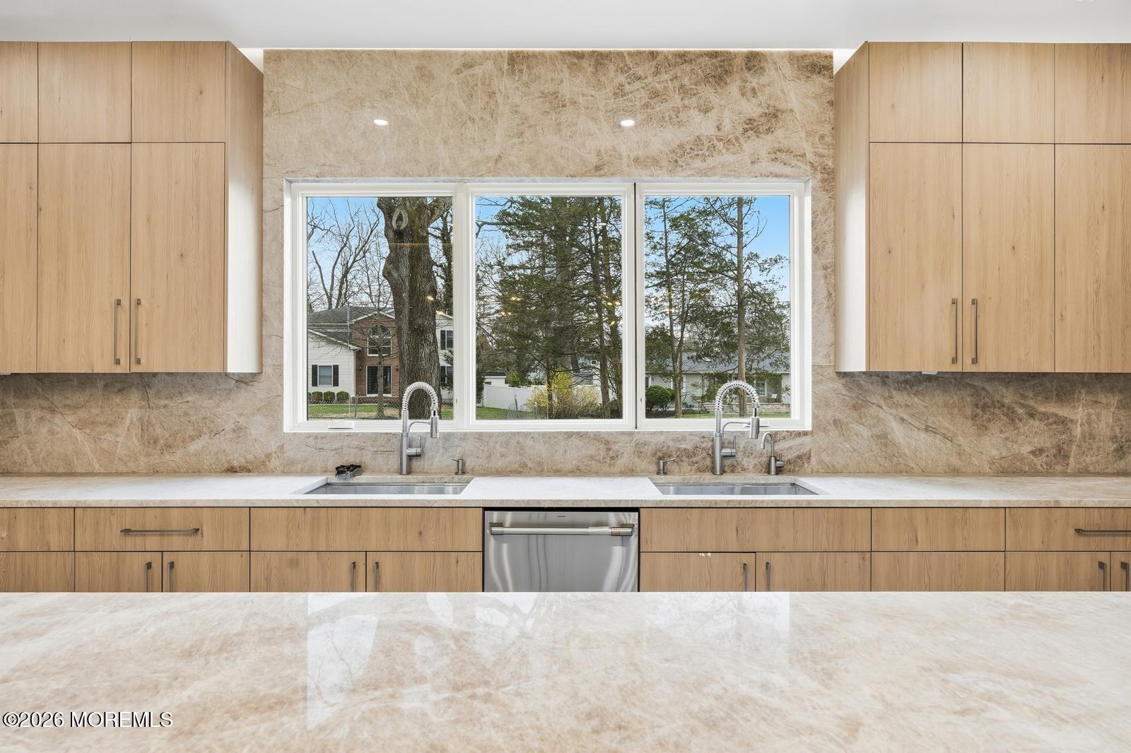 152 Ampere Avenue Oakhurst, NJ 07755 - Photo 15 of 18 a kitchen with stainless steel appliances granite countertop a sink a granite counter tops and a large window