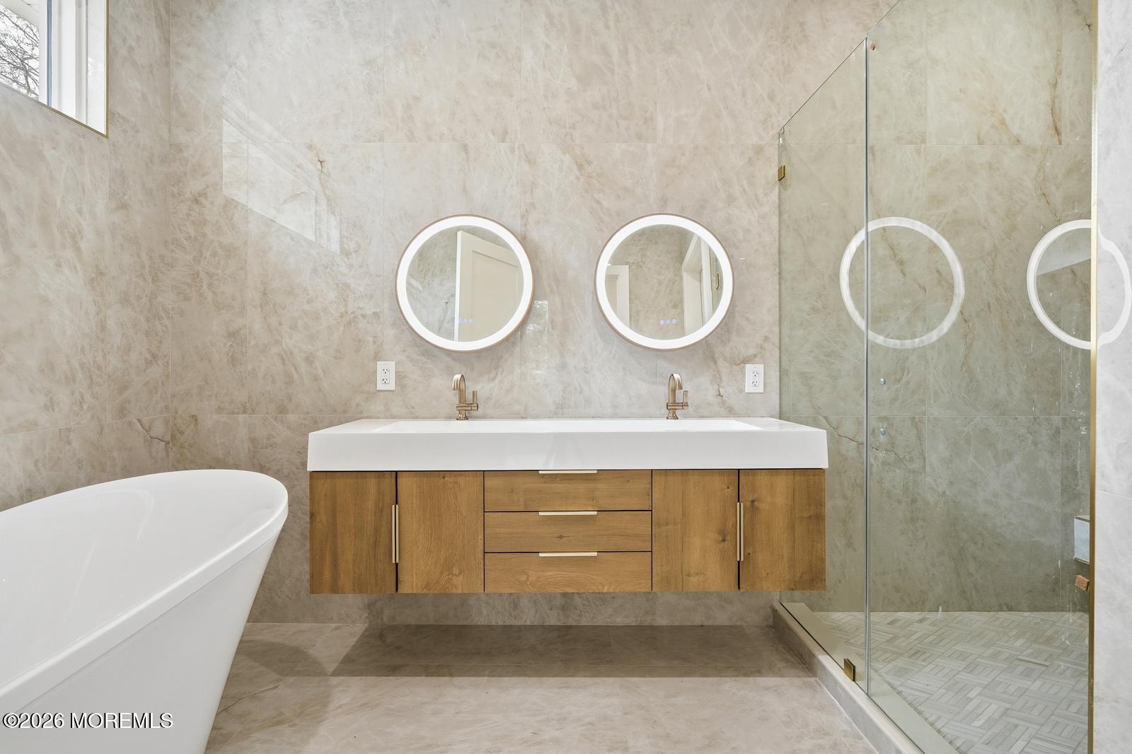 152 Ampere Avenue Oakhurst, NJ 07755 - Photo 7 of 18 a bathroom with a double vanity sink mirror and bathtub