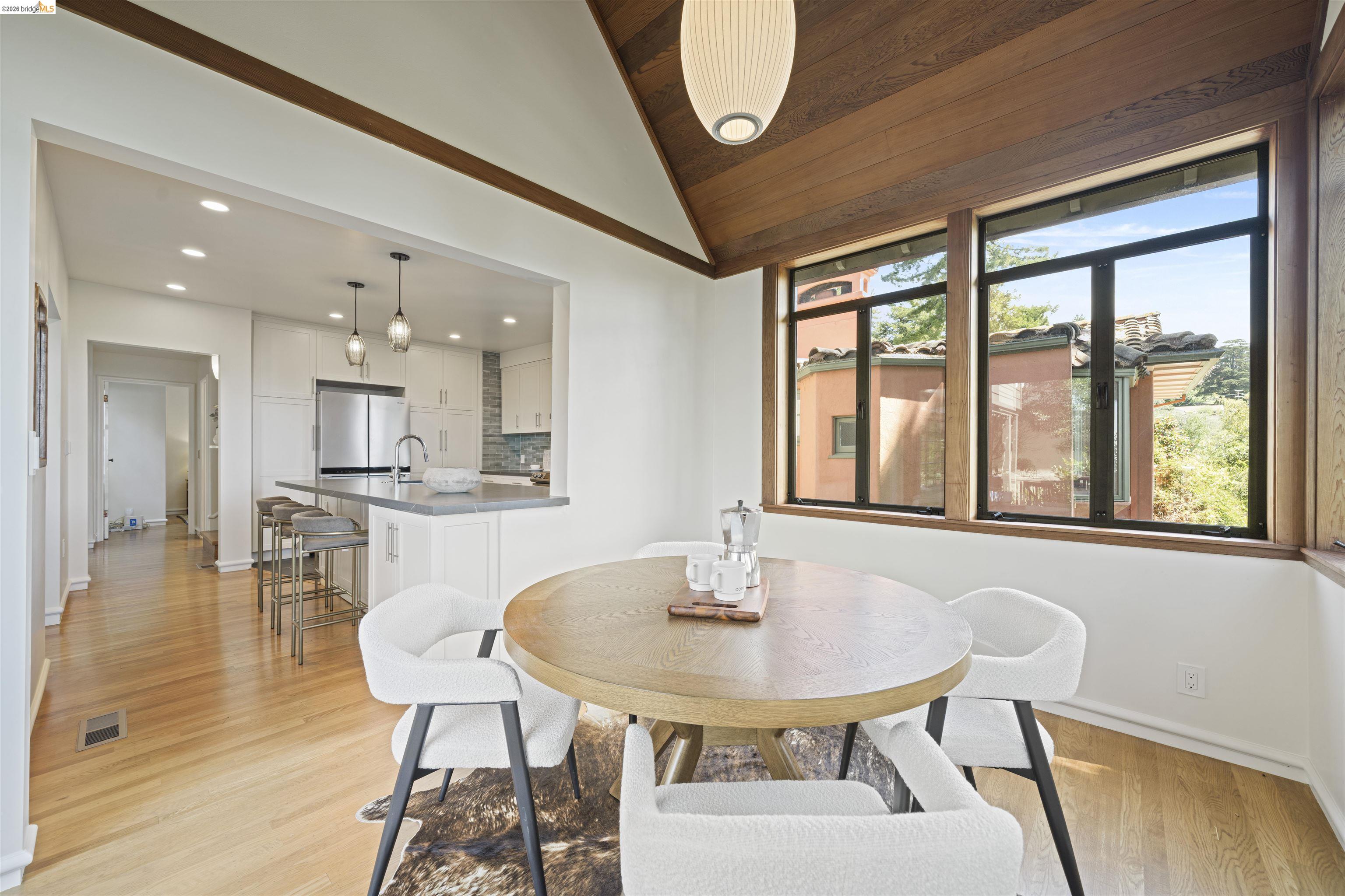 1170 Sterling Avenue Berkeley, CA 94708 - Photo 14 of 52 Sunroom with vaulted ceiling, light wood-type flooring, and recessed lighting
