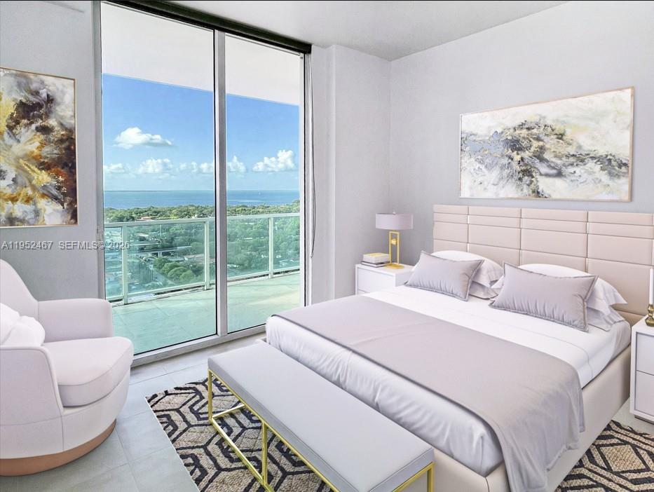 2525 Southwest 3rd Avenue, Unit 1709 Miami, FL 33129 - Photo 5 of 15 a bedroom with a bed and a large window with garden view