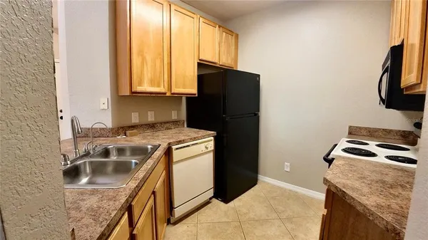 $165,000 | 10017 Courtney Palms Boulevard, Unit 304, Tampa, FL 33619