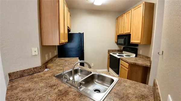 $165,000 | 10017 Courtney Palms Boulevard, Unit 304, Tampa, FL 33619