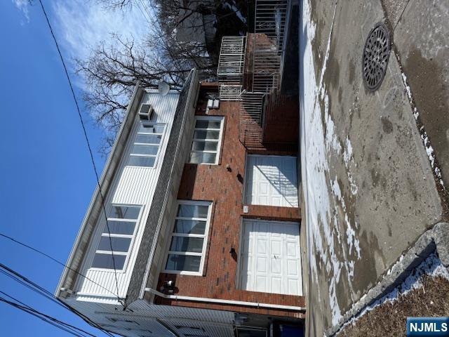 689 Fairview Avenue Fairview, NJ 07022 - Photo 1 of 2 a front view of a house with a yard