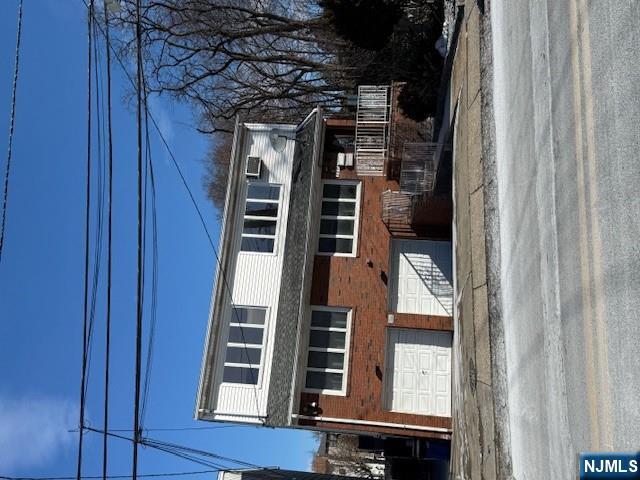689 Fairview Avenue Fairview, NJ 07022 - Photo 2 of 2 a front view of a house with a yard
