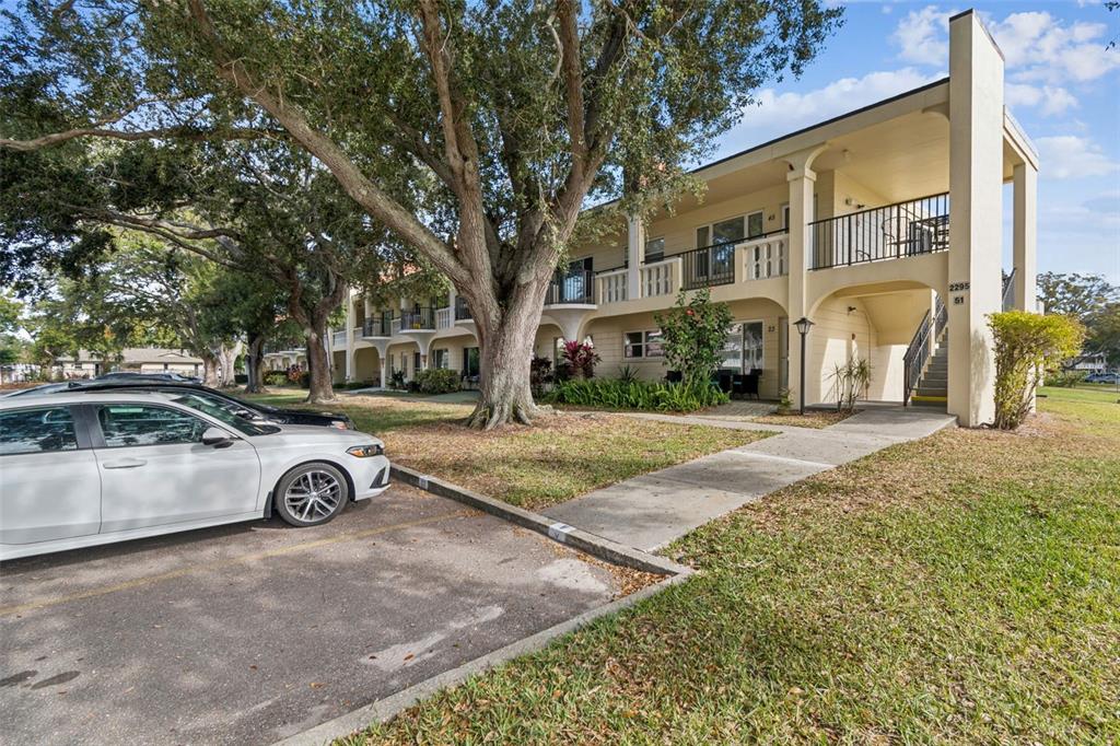 2295 Mexican Way, Unit 21 Clearwater, FL 33763 - Photo 33 of 90 a view of a street with a cars parked side of it