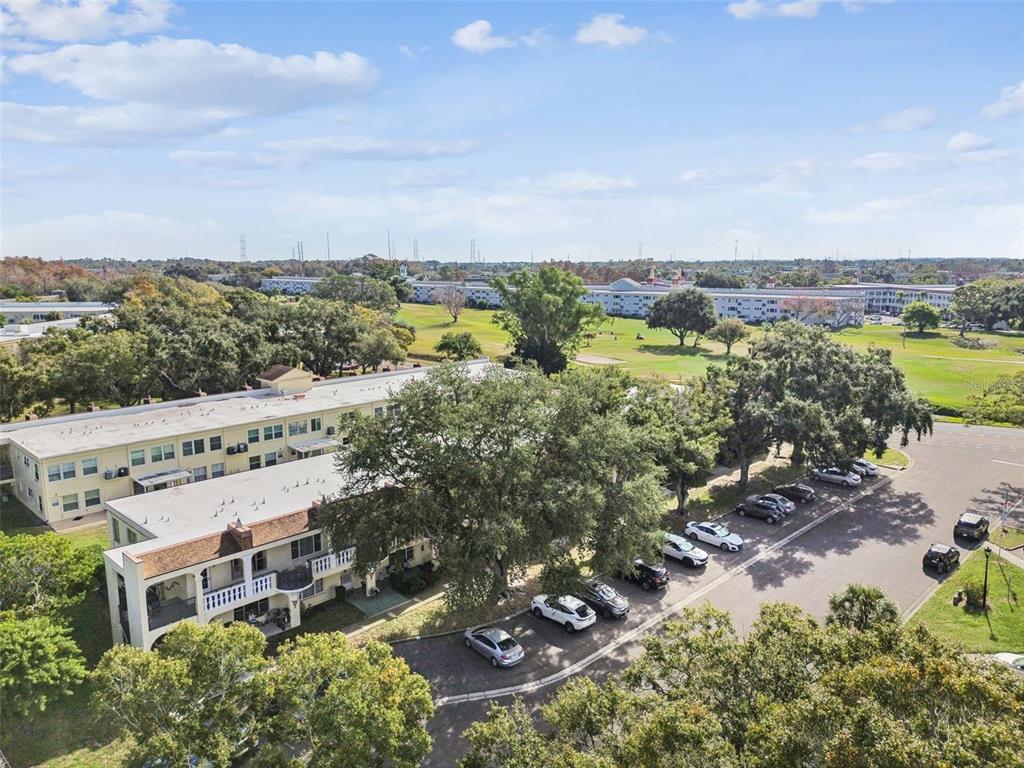 2295 Mexican Way, Unit 21 Clearwater, FL 33763 - Photo 36 of 90 an aerial view of a house with a garden