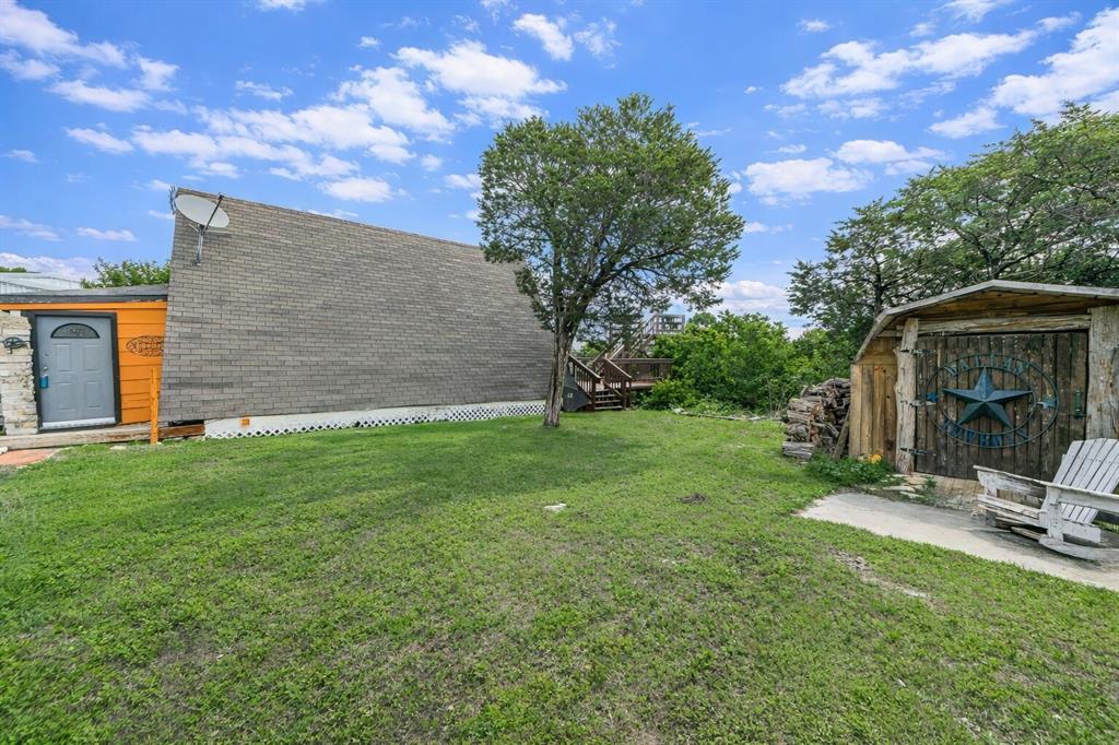 9509 Valley View Trail Rio Vista, TX 76093 - Photo 9 of 29 View of the side of the House & Shed.