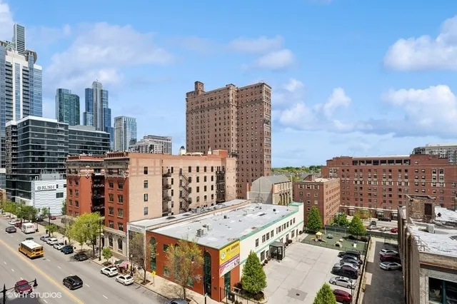 a view of a balcony with furniture
