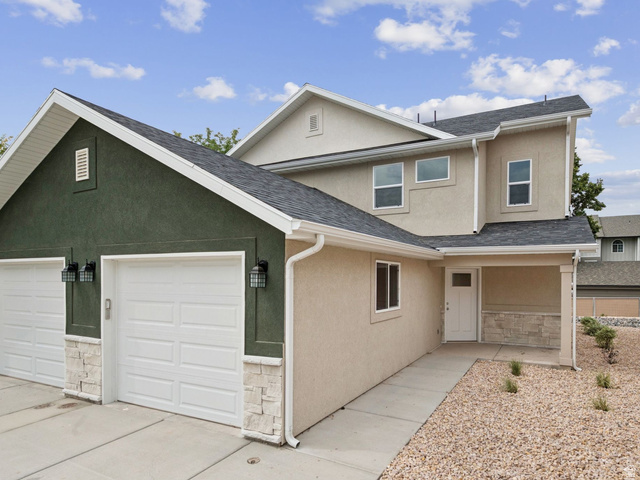 1617 North Angel Street Layton, UT 84041 - Photo 1 of 43 Traditional-style house with stucco siding, stone siding, and roof with shingles
