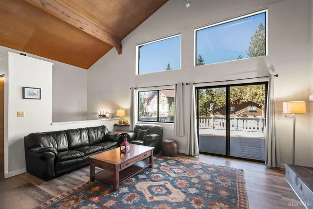 a living room with furniture and a gate