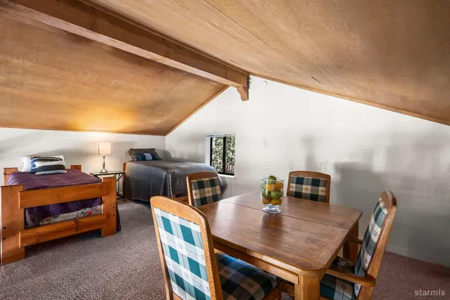 a workspace with furniture and window