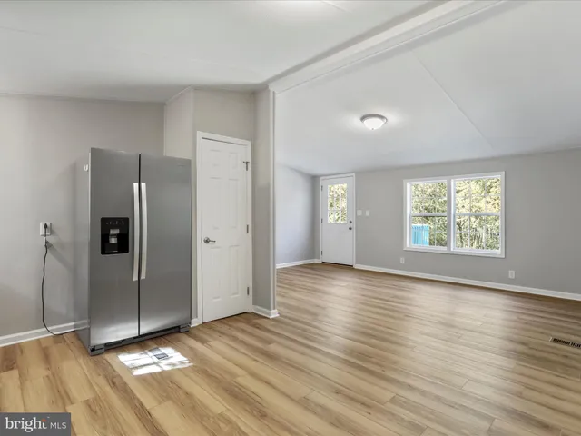 a view white cabinets and sink