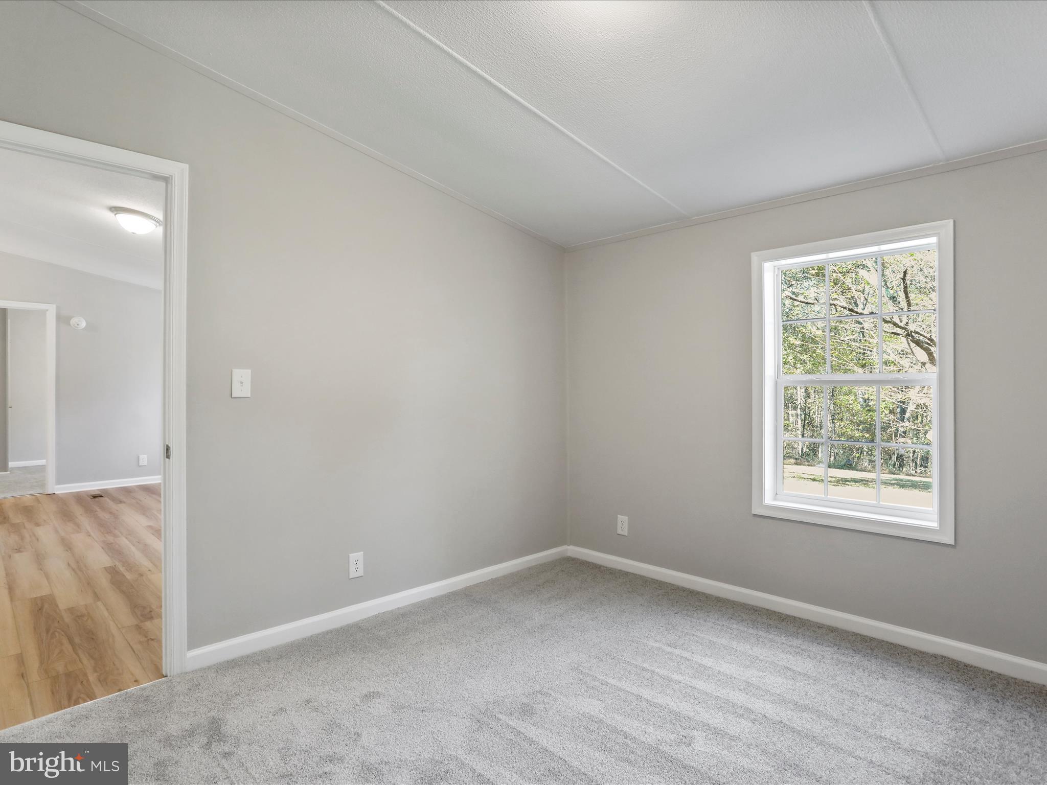 156 Potomacview Lane Berkeley Springs, WV 25411 - Photo 19 of 27 an empty room with a window