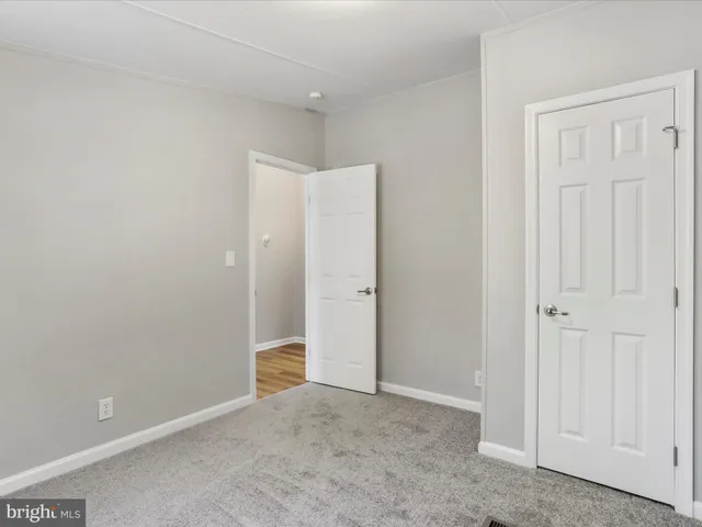 a bathroom with a toilet and a bathtub