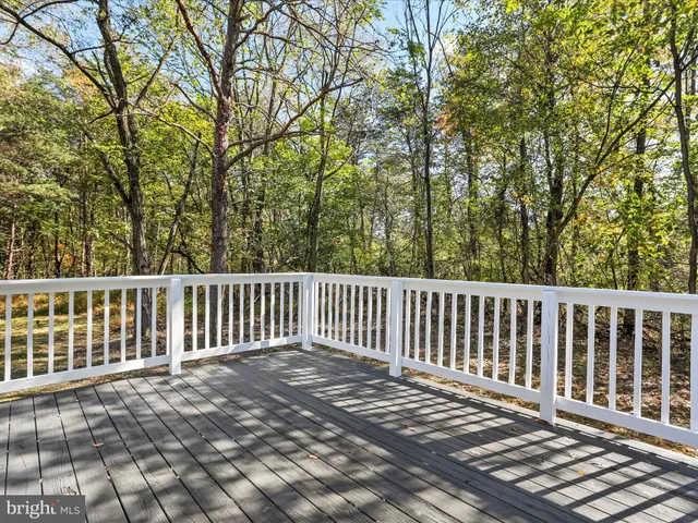 a view of a wooden street from a balcony