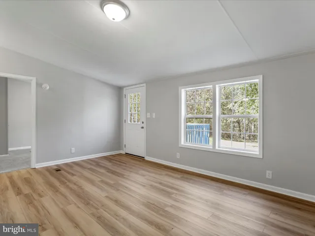 a kitchen with a refrigerator stove and microwave
