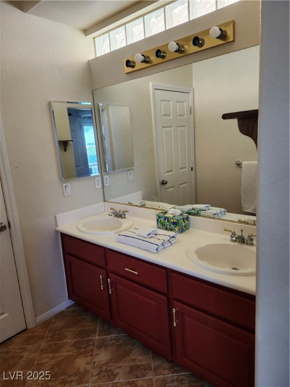 6672 Coronado Palms Avenue Las Vegas, NV 89139 - Photo 18 of 39 Bathroom featuring double vanity