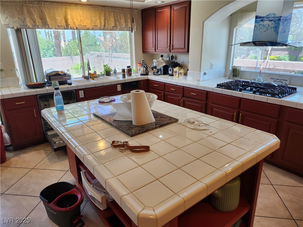 6672 Coronado Palms Avenue Las Vegas, NV 89139 - Photo 2 of 39 Kitchen featuring wall chimney exhaust hood, plent