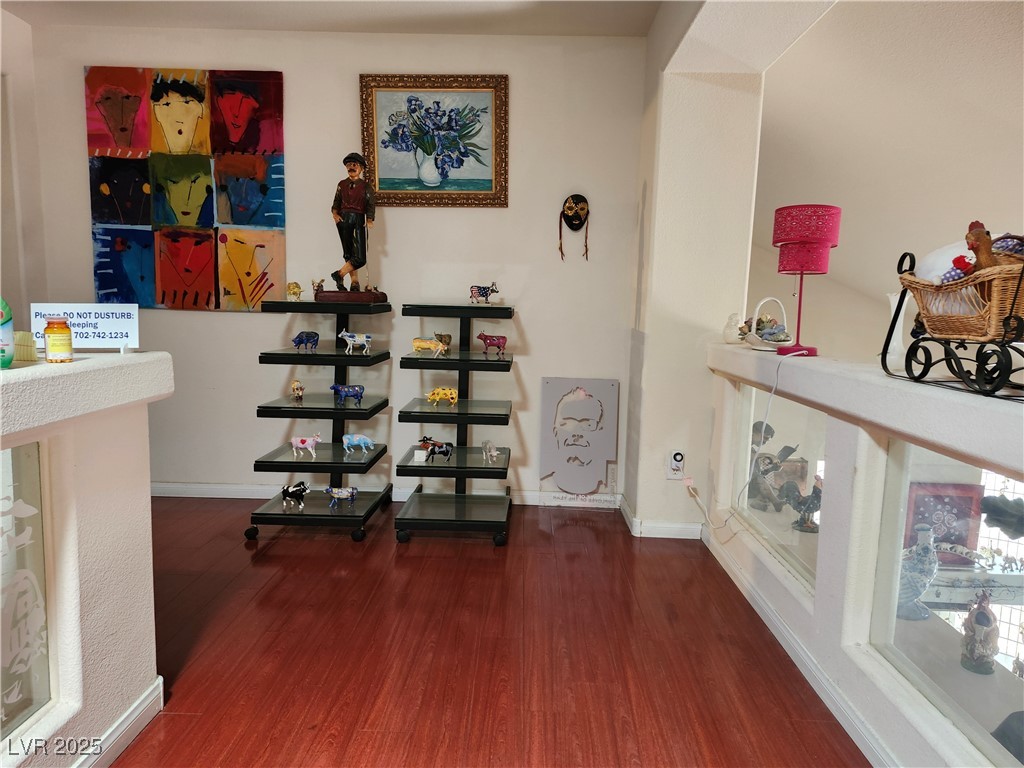 6672 Coronado Palms Avenue Las Vegas, NV 89139 - Photo 23 of 39 Hallway with wood finished floors and baseboards