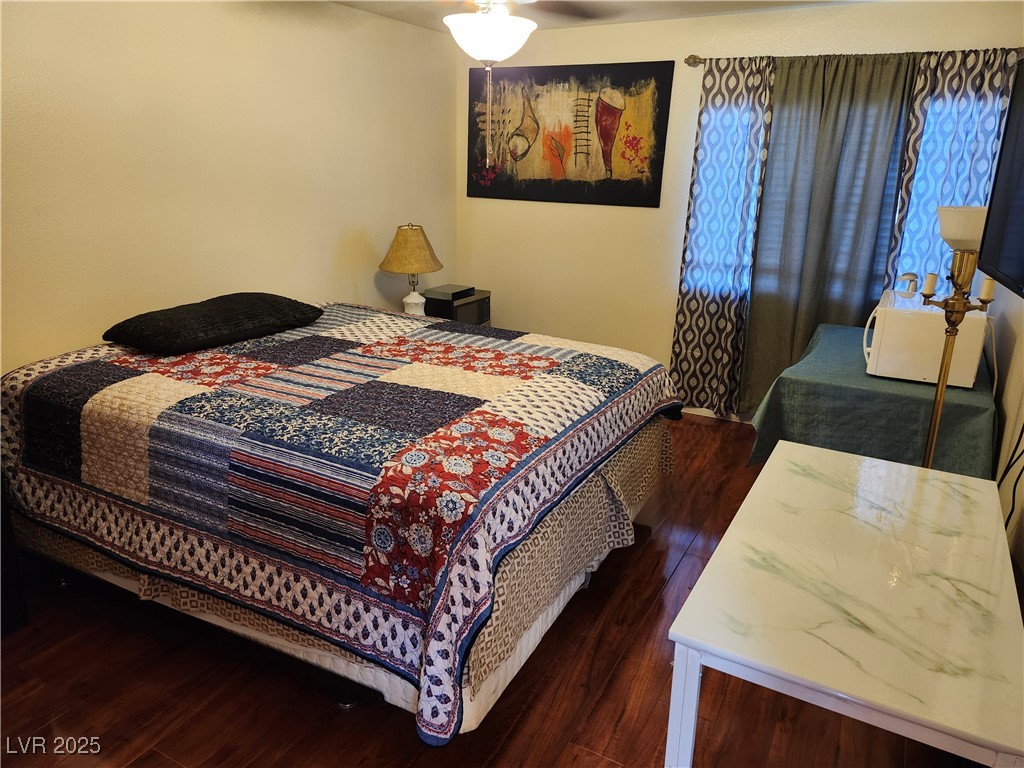 6672 Coronado Palms Avenue Las Vegas, NV 89139 - Photo 30 of 39 Bedroom with wood finished floors and ceiling fan
