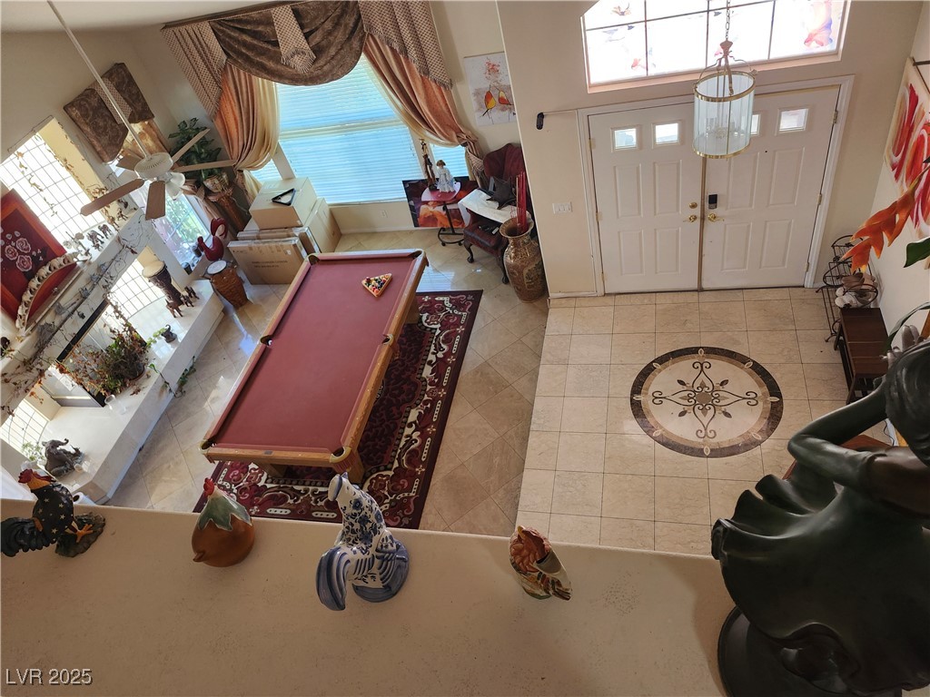 6672 Coronado Palms Avenue Las Vegas, NV 89139 - Photo 35 of 39 Entryway with healthy amount of natural light and