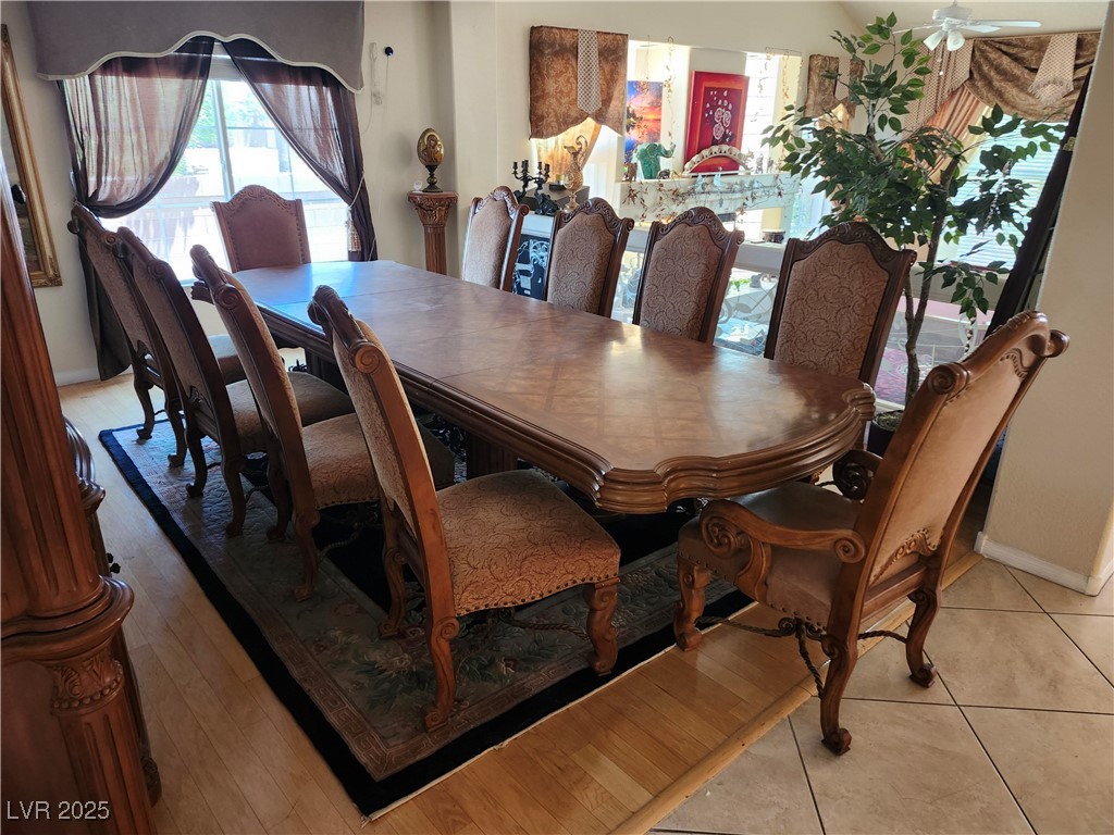6672 Coronado Palms Avenue Las Vegas, NV 89139 - Photo 7 of 39 Dining area with baseboards and ceiling fan