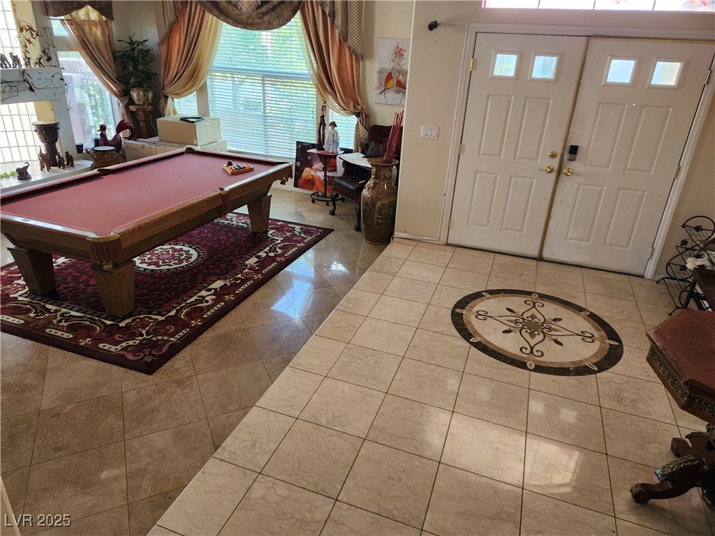6672 Coronado Palms Avenue Las Vegas, NV 89139 - Photo 9 of 39 Tiled entrance foyer with billiards table