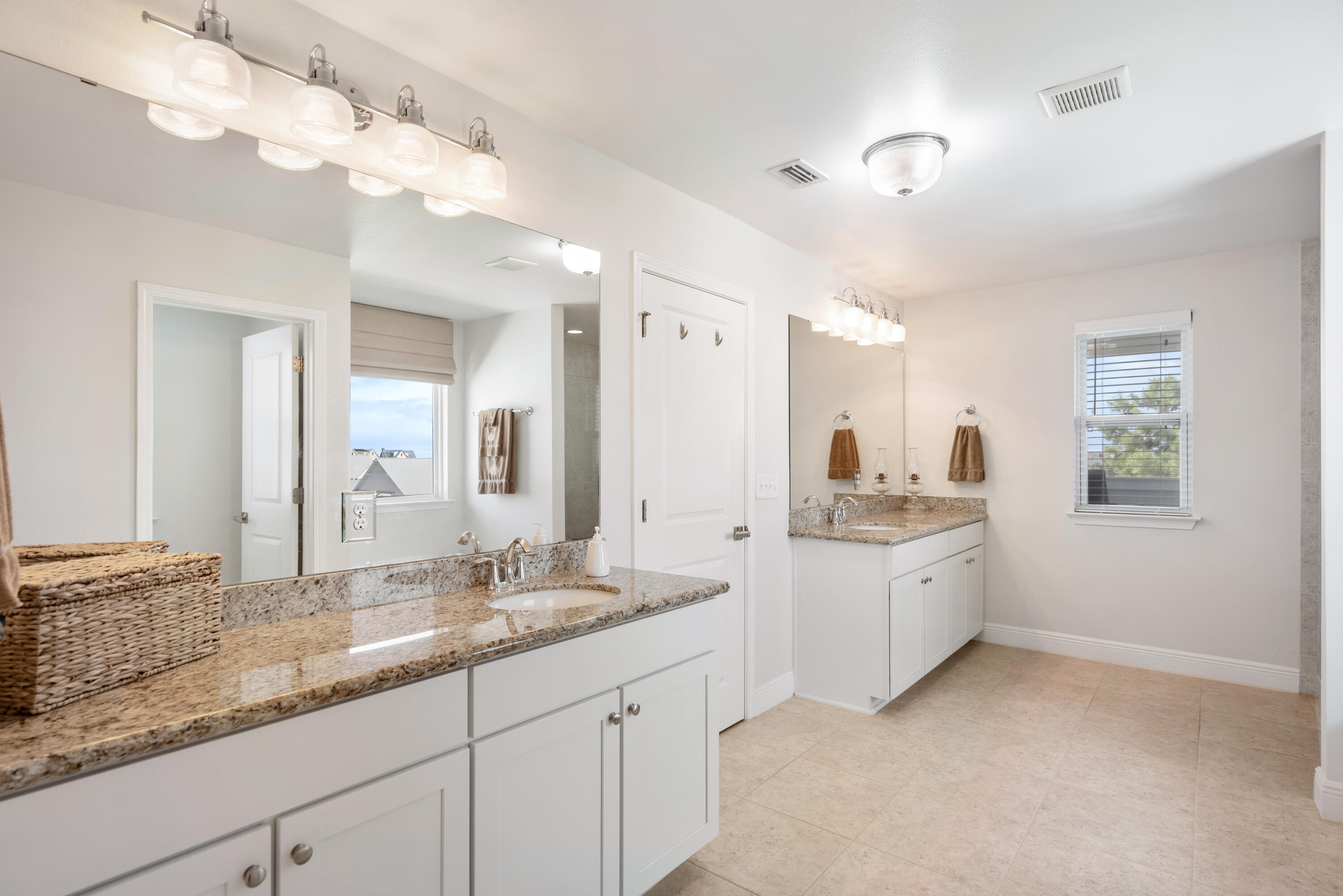 13 Inlet Cove Inlet Beach, FL 32461 - Photo 27 of 49 a large bathroom with a granite countertop double vanity sink a mirror and shower