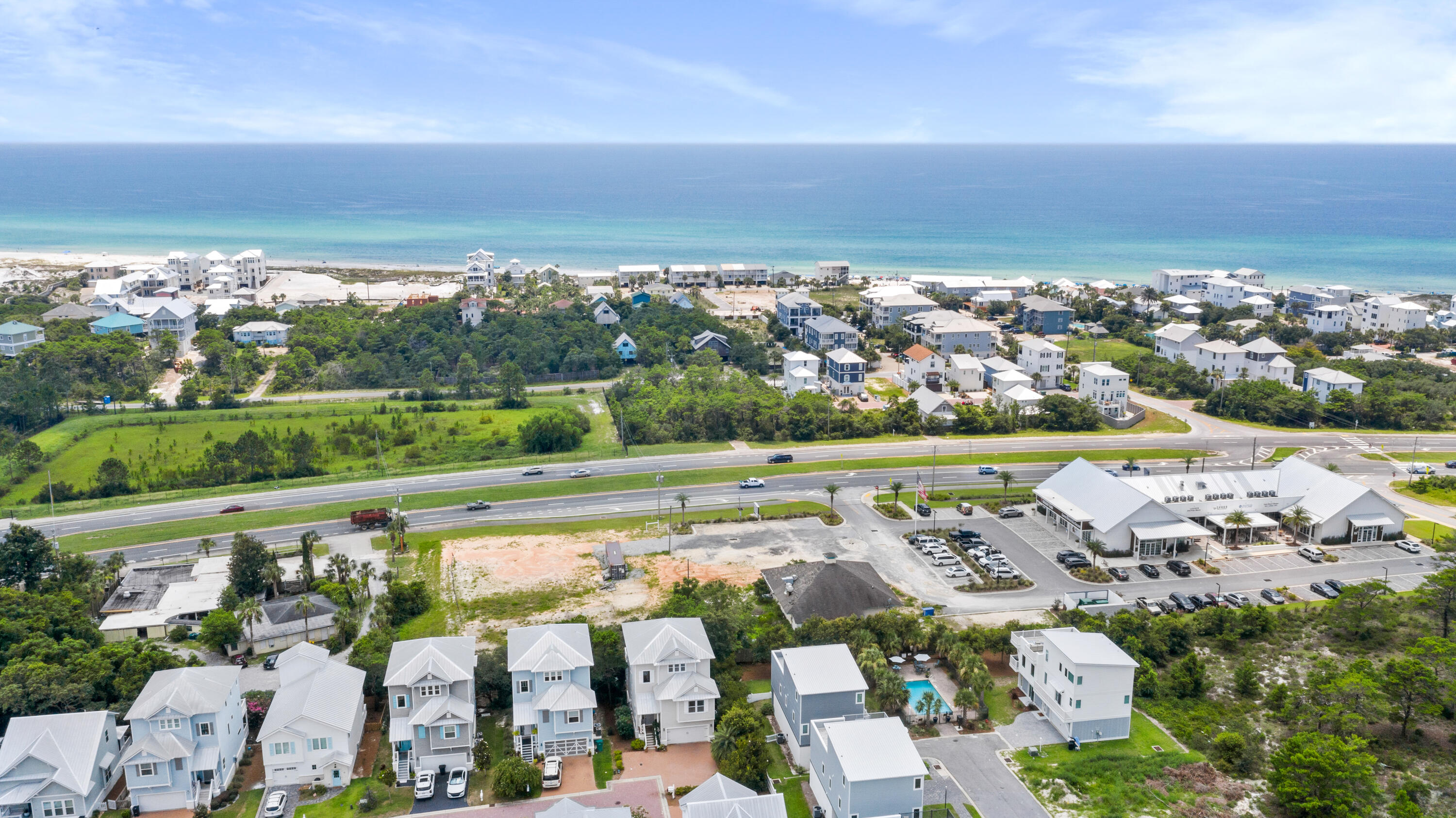 13 Inlet Cove Inlet Beach, FL 32461 - Photo 3 of 49 an aerial view of a city with lots of residential buildings ocean and mountain view in back
