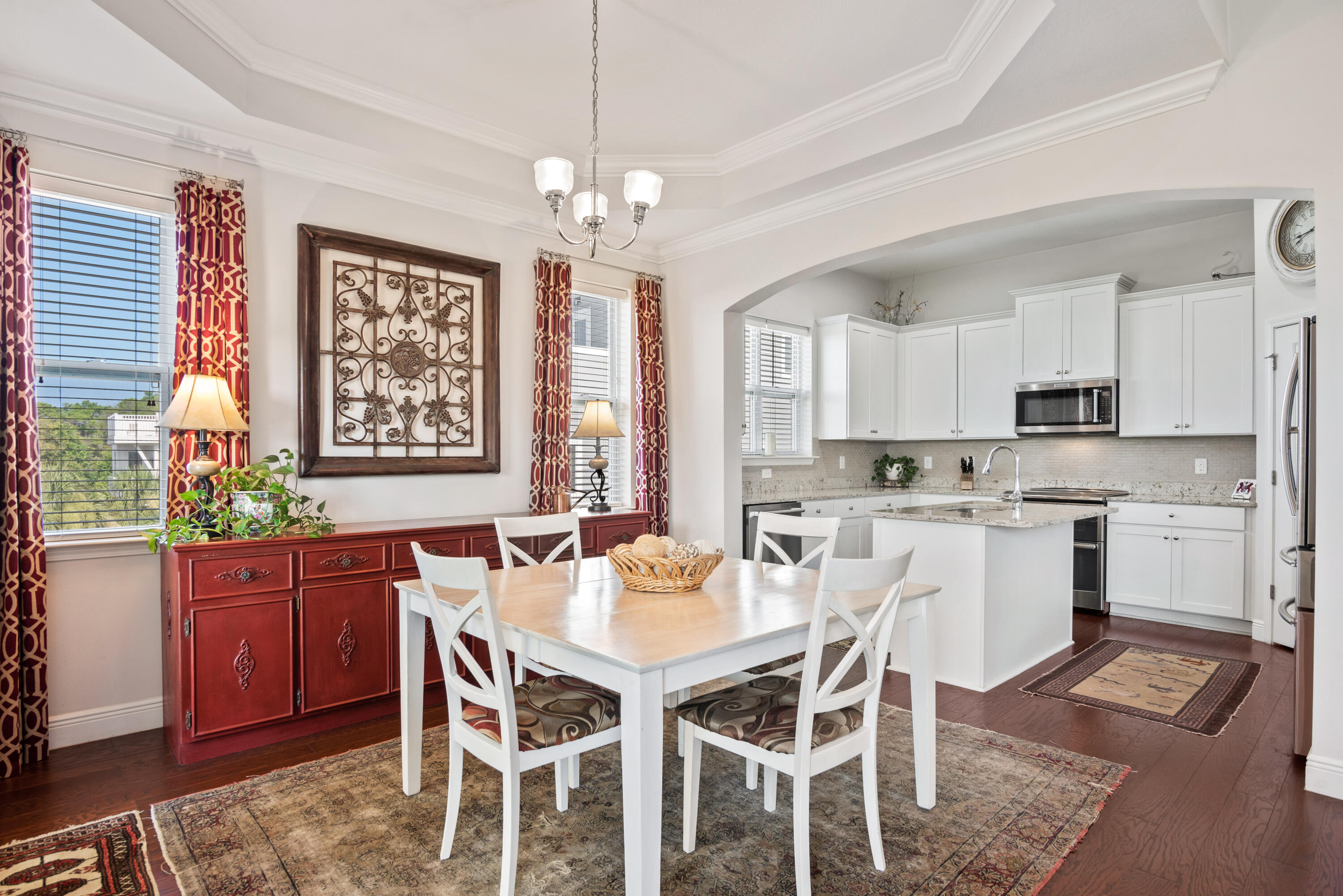 13 Inlet Cove Inlet Beach, FL 32461 - Photo 10 of 49 a dining room with wooden floor a chandelier a wooden table and chairs