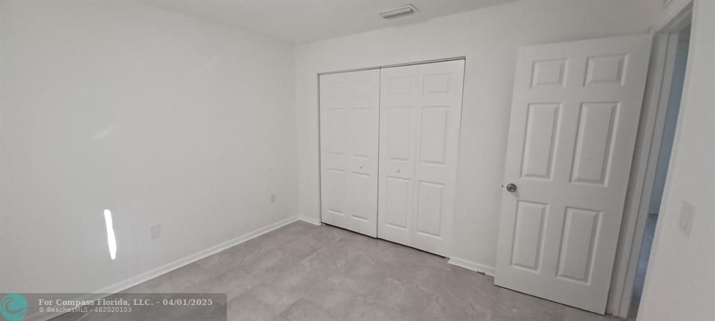 1410 Southeast 7th Street Okeechobee, FL 34974 - Photo 12 of 22 a view of an empty room