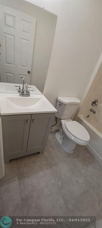 1410 Southeast 7th Street Okeechobee, FL 34974 - Photo 7 of 22 a bathroom with a sink and a toilet