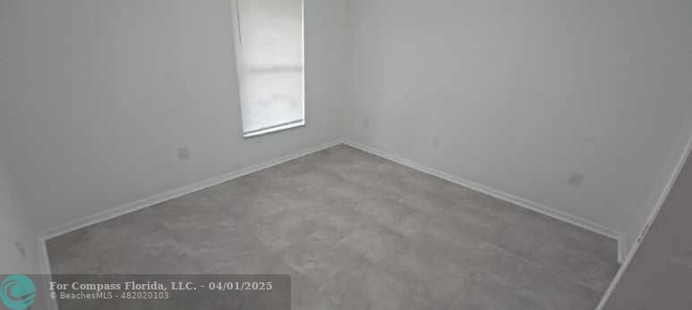 1410 Southeast 7th Street Okeechobee, FL 34974 - Photo 8 of 22 a view of a window in an empty room