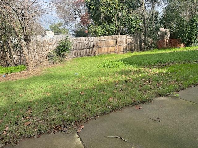 3431 Hunter Lane Carmichael, CA 95608 - Photo 6 of 6 a view of a backyard with a small cabin