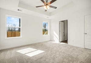 19 Greenbriar Loop Angleton, TX 77515 - Photo 12 of 19 Welcoming primary bedroom filled with natural light.