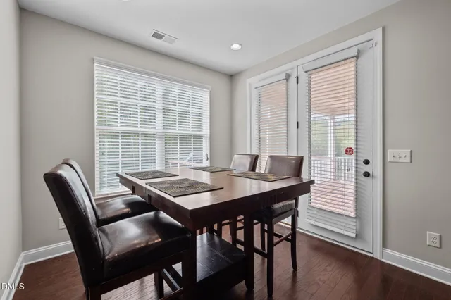 a view of a balcony with furniture
