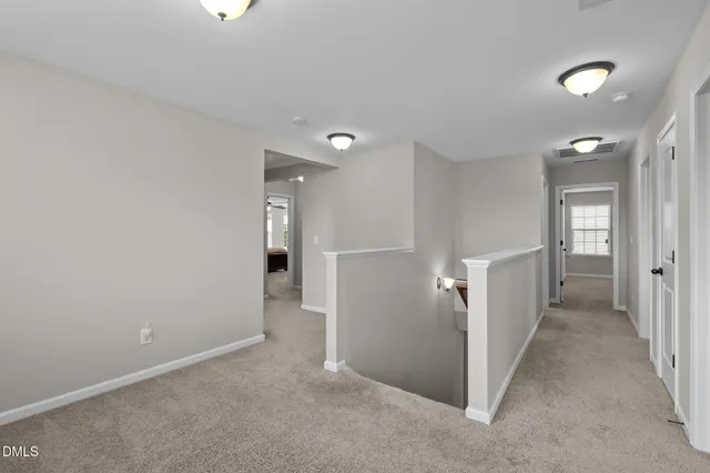 a room with furniture and a window