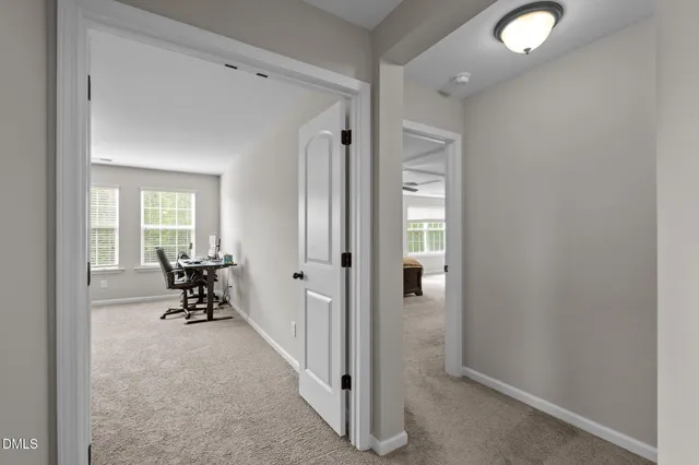 a workspace with furniture and a window